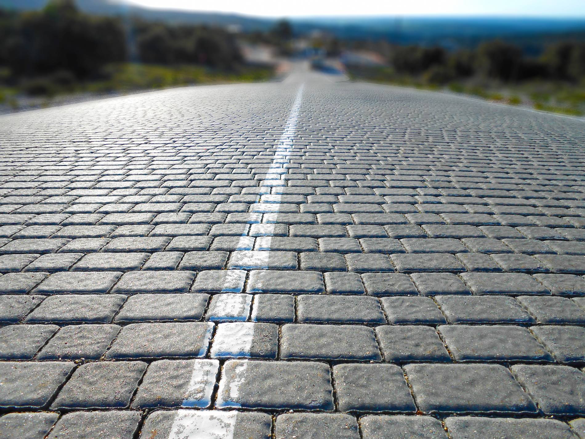 background-with-square-cobblestone-floor-line-painted-white_1900x1425